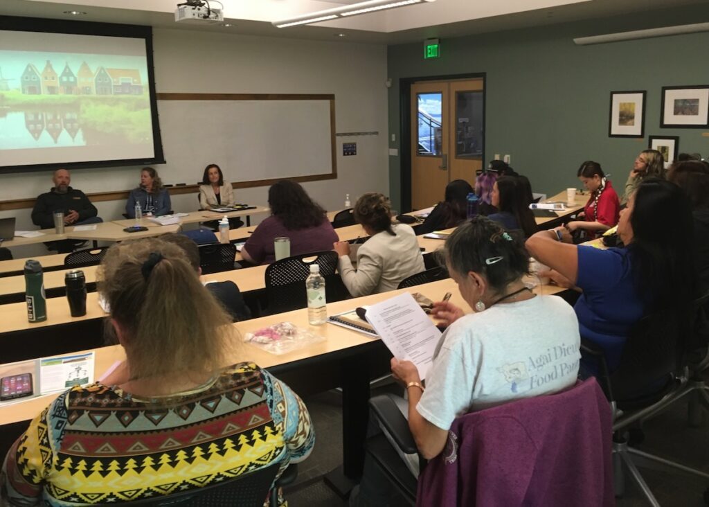 participants sitting in conference room